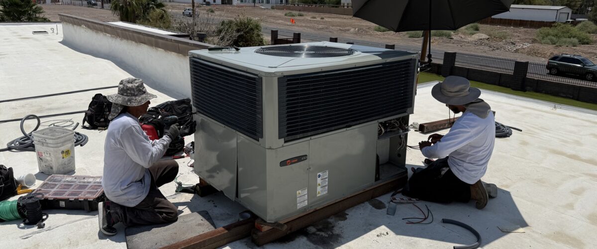 Legacy A/C technicians installing new unit