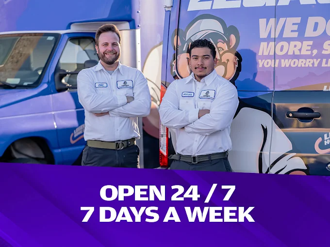 Legacy technician posed in front of 24/7 messaging
